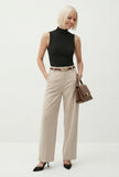 FJØRNA women's wool wide-leg high waist trousers displayed on a model, showcasing a stylish and comfortable pant design.