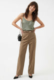 FJØRNA women's wool wide-leg high-waist trousers, stylish pants with a relaxed fit and tailored design, shown in a natural setting
