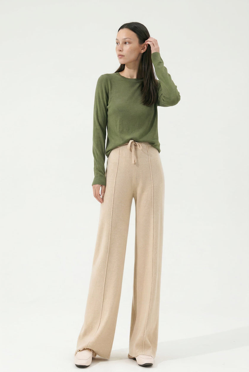 Women's Merino wool wide-leg trousers by FJØRNA, high-waist design, stylish and comfortable for everyday wear.