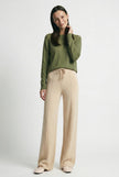 Women’s merino wool wide-leg trousers by FJØRNA, high waist, stylish and comfortable pants for a modern look.