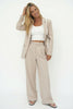 Women’s wide-leg high-waist trousers by FJØRNA, stylish and comfortable pants featuring a modern fit and clean design.