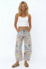 Women’s wide-leg denim jeans by FJØRNA, featuring a relaxed fit and classic blue denim fabric, shown on a model.