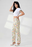 Women’s denim jeans by FJØRNA, stylish pants with a classic fit, shown on a model in a casual outfit.