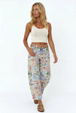Women’s wide-leg denim jeans by FJØRNA, featuring a relaxed fit and classic blue wash, shown on a model.