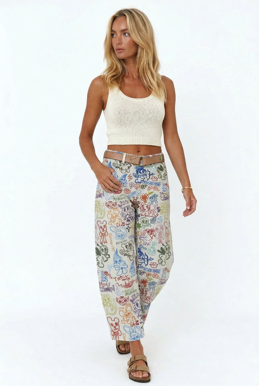 Women’s wide-leg denim jeans by FJØRNA, featuring a relaxed fit and classic blue wash, shown on a model.