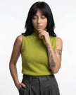 FJØRNA sleeveless wool vest for women, soft knit top, lightweight, and stylish, shown on a model with a neutral background.