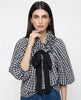 FJØRNA women's cotton blouse with ruffle detail, stylish and lightweight top perfect for casual or dressy occasions.