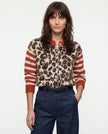 FJØRNA women's cotton cardigan, soft and lightweight, displayed on a hanger with a neutral background.