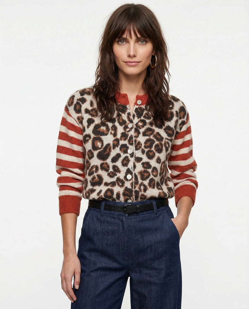 FJØRNA women's cotton cardigan, soft and lightweight, displayed on a hanger with a neutral background.
