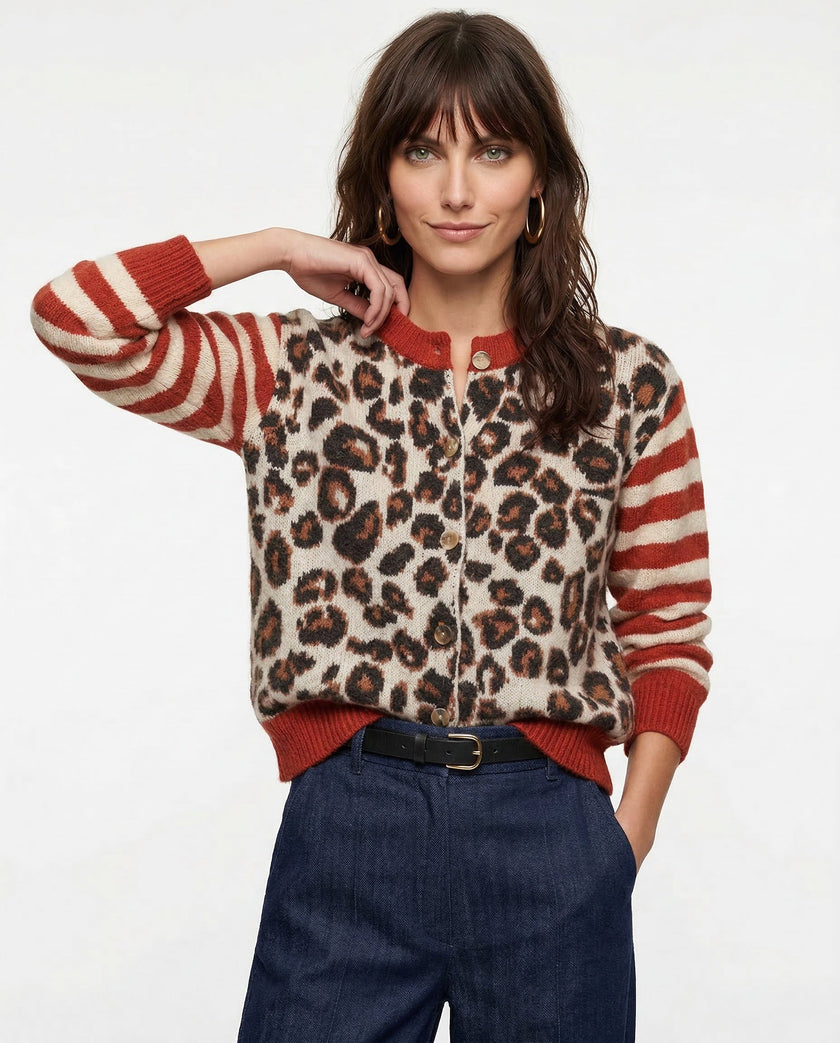 FJØRNA women's cotton cardigan, soft and lightweight, shown as a versatile women's top with long sleeves and a relaxed fit.