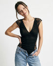 FJØRNA women's mesh top featuring a lightweight, breathable design with a stylish, semi-sheer fabric in a modern fit.