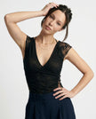 FJØRNA Verde Lumière mesh blouse featuring a lightweight, semi-transparent fabric with a stylish, modern design.