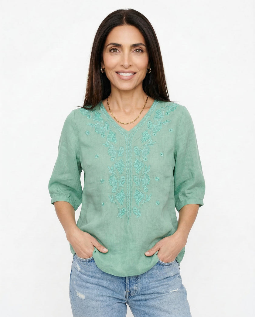 FJØRNA women's cotton V-neck blouse, light-colored top with soft fabric and relaxed fit, ideal for casual or office wear