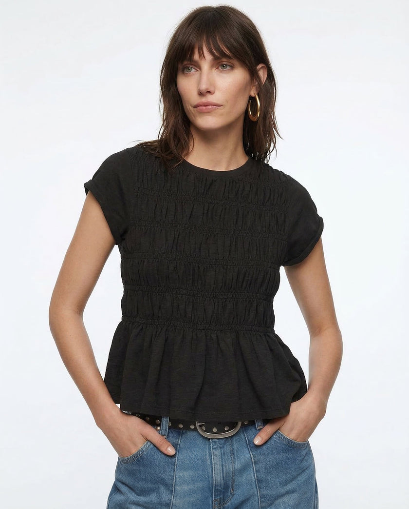FJØRNA women's linen peplum blouse with short sleeves and a relaxed fit, featuring a stylish, lightweight design.