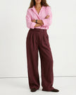 FJØRNA linen blend wide-leg high waist women's pants, showcasing the fabric's quality and realistic texture in a natural pose.