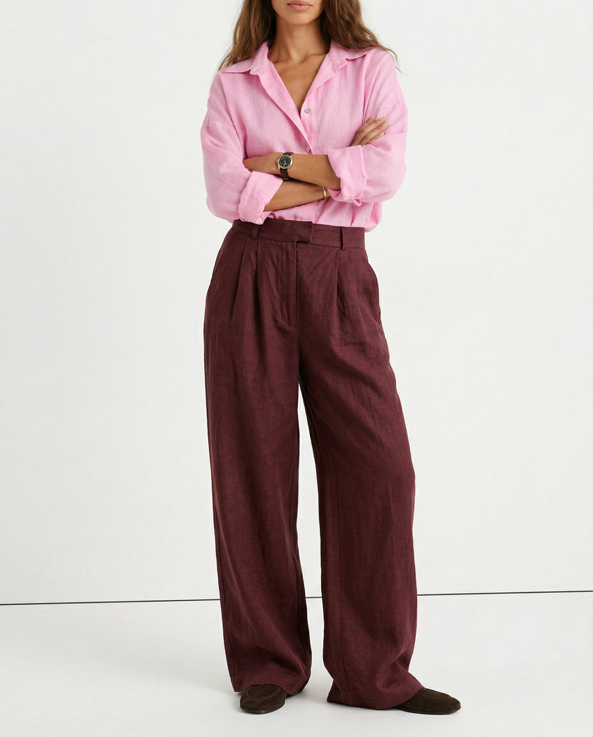 FJØRNA linen blend wide-leg high waist women's pants, showcasing the fabric's quality and realistic texture in a natural pose.