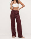 FJØRNA linen blend women's wide-leg high-waist trousers showcasing smooth fabric and tailored fit in a realistic, high-quality image.