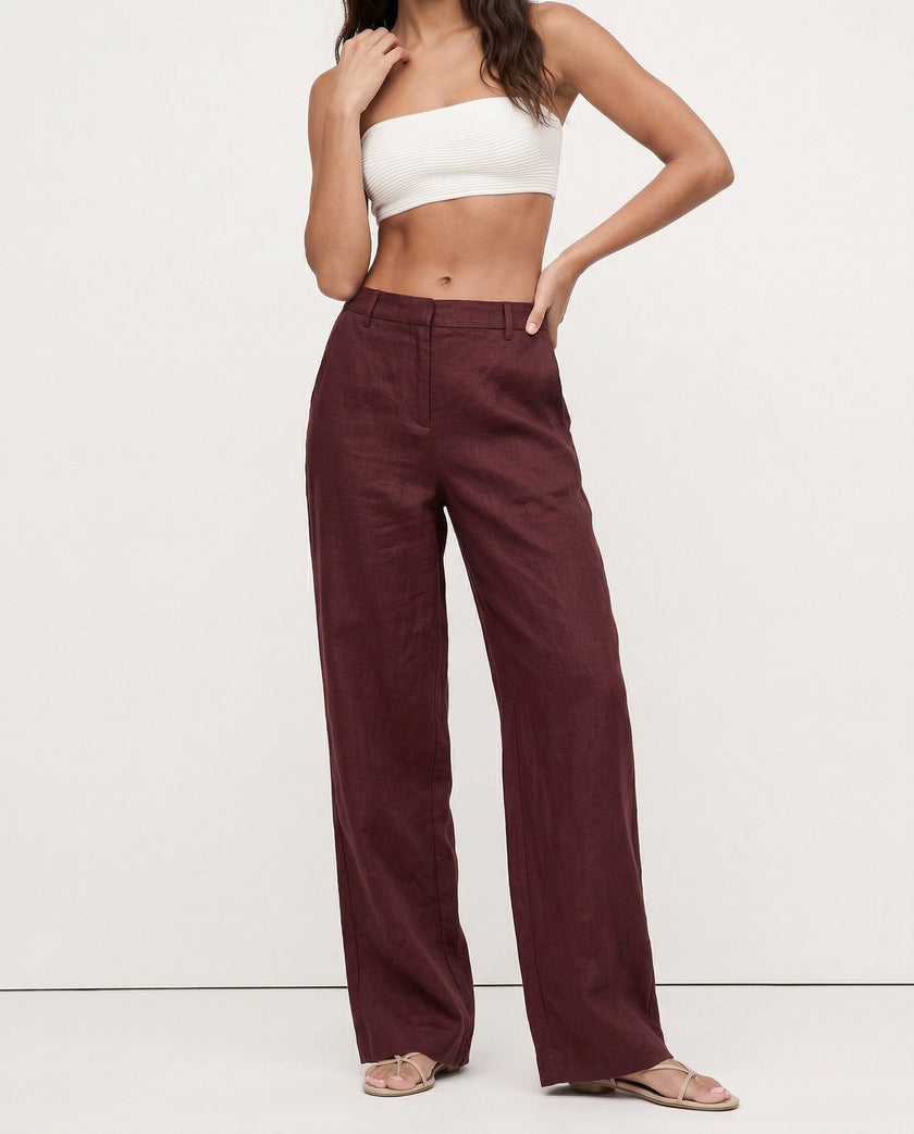 FJØRNA linen blend women's wide-leg high-waist trousers showcasing smooth fabric and tailored fit in a realistic, high-quality image.