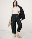 FJØRNA linen wide leg trousers for women with elastic waist, showcasing high-quality, realistic linen fabric and relaxed fit.