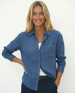 Women’s Linen Blend Shirt by FJØRNA, stylish and comfortable top featuring a lightweight, casual design worn by a model.