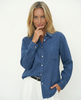 FJØRNA linen blend women's shirt, stylish and lightweight top with a relaxed fit, worn by a female model.