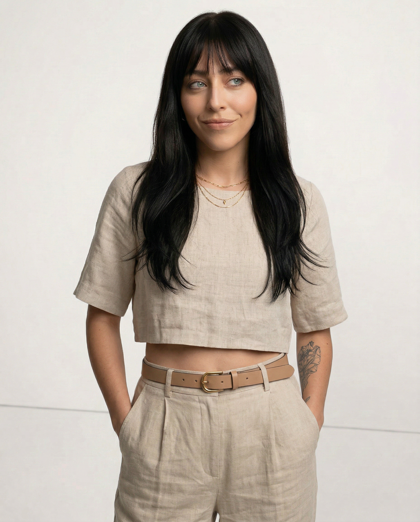FJØRNA linen crop top for women with short sleeves, featuring a relaxed fit and natural fabric texture.