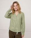Women’s linen V-neck shirt by FJØRNA, showcasing a lightweight, breathable top with a relaxed fit and natural fabric texture.