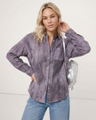 FJØRNA women's linen pleated shirt, stylish lightweight top, model wearing crisp white linen blouse with pleats and long sleeves.