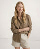 FJØRNA linen women’s open collar shirt, lightweight and breathable, shown on a model highlighting the fabric quality and relaxed fit.