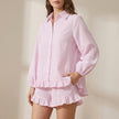 FJØRNA women's summer two-piece striped co-ord set with ruffled top and matching shorts, front view, casual stylish outfit.