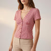 Front view of FJØRNA women's summer gingham blouse with V-neck, lightweight and stylish for warm weather.