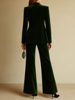 Emerald green loose velvet two-piece suit set by FJØRNA, featuring a stylish blazer and matching trousers.