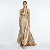Gold women's halter neck satin maxi dress by FJØRNA with flowing fabric and elegant design, perfect for formal occasions.