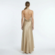 Gold satin women's halter neck maxi dress by FJØRNA, flowing design with a stylish halter neckline and elegant length.