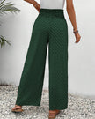 Green FJØRNA lightweight summer trousers for women, wide-leg breathable flowy style, perfect for warm weather.