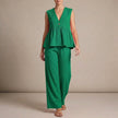 Green FJØRNA women's summer two-piece set with wide-leg pants and V-neck top, perfect for warm weather and casual wear.