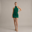 Green FJØRNA halter neck mini dress with a draped top and bodycon fit, shown on a model.