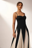 FJØRNA Griselda color block maxi slip dress in black, featuring a flowing silhouette and stylish design.