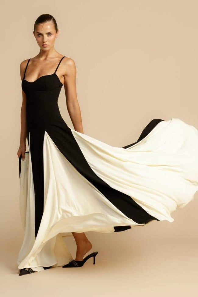FJØRNA Griselda color block maxi slip dress in white, featuring a flowing silhouette and elegant design.