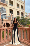 FJØRNA Griselda color block maxi slip dress in black, featuring a sleek, flowing silhouette and stylish design.