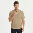 FJØRNA men's tan linen short sleeve Henley T-shirt with a collar, shown adjusting the collar on a plain background.