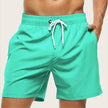 Men's quick-dry swim shorts with elastic waist by FJØRNA, featuring a stylish design for beach and pool activities.