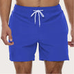 Men's FJØRNA quick-dry swim shorts with elastic waist, featuring a sleek design ideal for beach and pool activities.