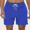 Men's FJØRNA quick-dry swim shorts with elastic waist, featuring a sleek design ideal for beach and pool activities.