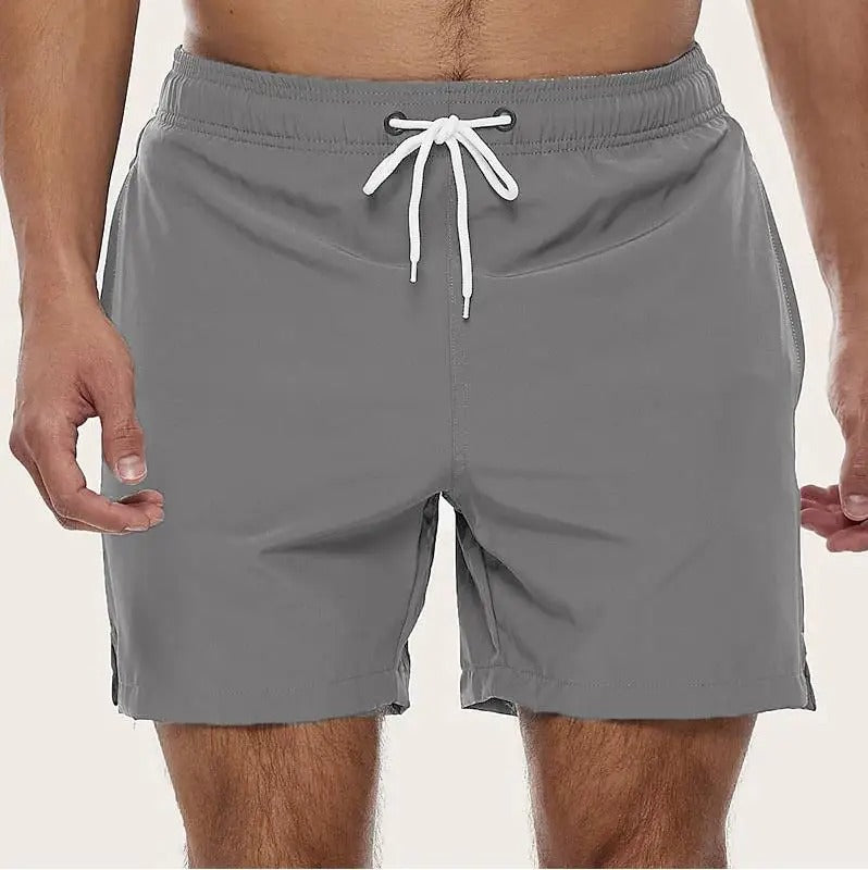 Men's quick-dry swim shorts with elastic waistband, FJØRNA men's swimwear, suitable for beach and pool activities.