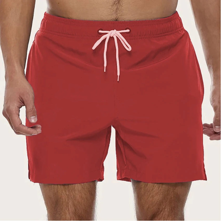 Men's quick-dry swim shorts with elastic waist by FJØRNA, featuring a stylish design ideal for beach and pool activities.