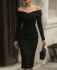 FJØRNA off-shoulder draped midi dress for women with sculpted waist, elegant and stylish evening dress on a model.