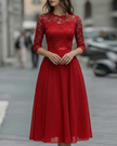 FJØRNA elegant lace bodice dress with soft flowing skirt, perfect for women’s formal occasions and special events.
