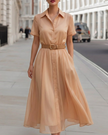 FJØRNA classic belted A-line midi shirt dress for women, featuring a waist belt and button-down front, styled for casual wear.
