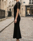 FJØRNA lace sleeve fitted midi dress for women, showcasing elegant lace details and a sleek, form-fitting silhouette.